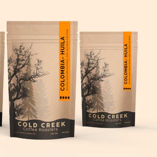 Coffee packaging for Cold Creek Coffee Roasters featuring Colombia Huila single-origin beans with earthy design and bold orange label.